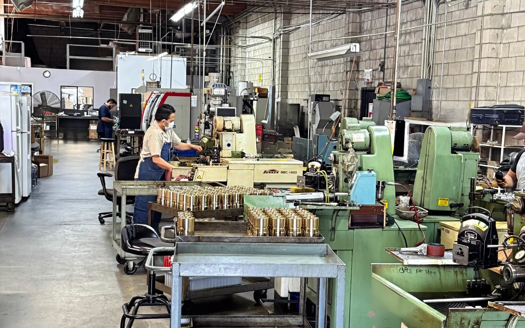 The JTR shop floor in South El Monte, with Sunnen honing machines and the crew at work