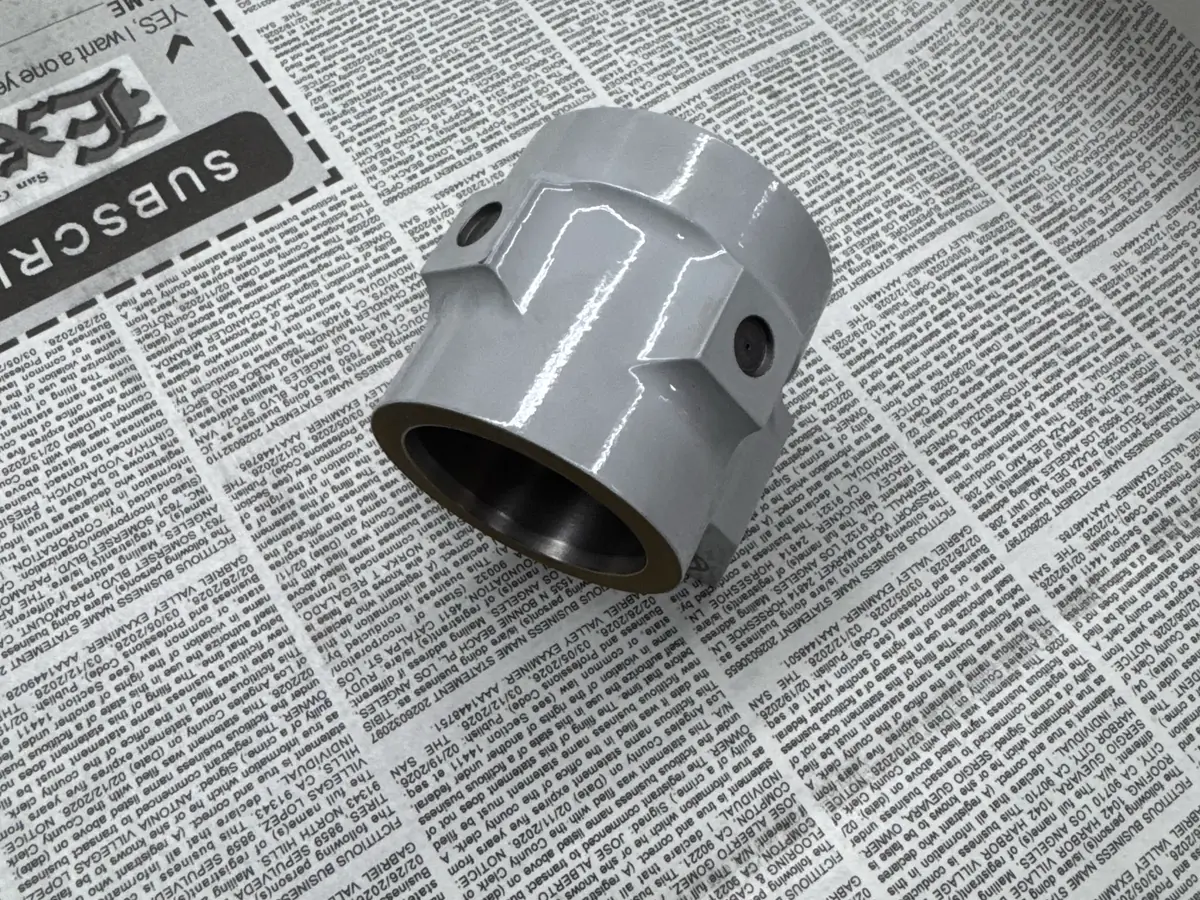 White housing with a bronze-lined bore, freshly finished