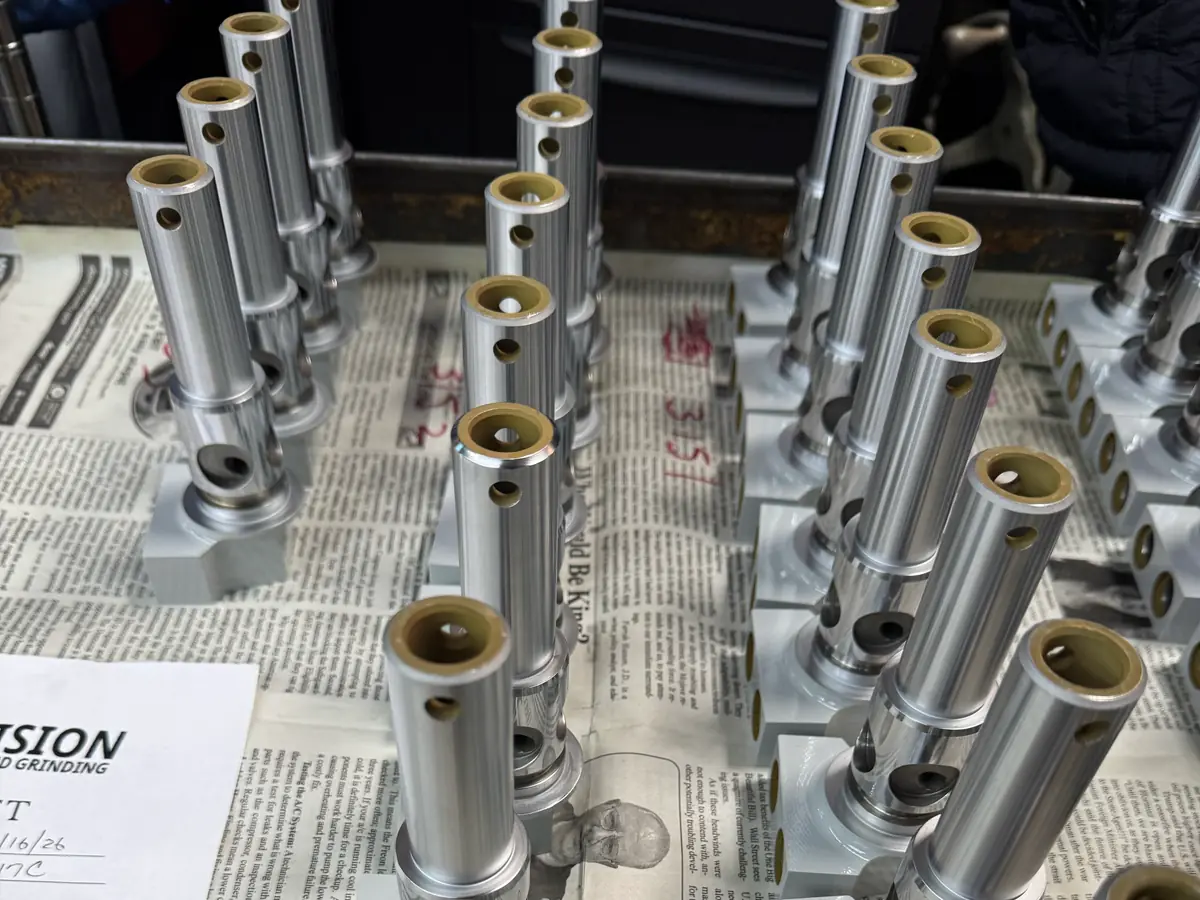 Rows of finished actuator assemblies staged for inspection